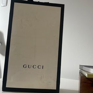 Gucci belt never worn- comes with original packaging and papers.